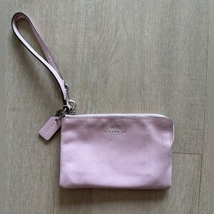 Light pink coach wristlet